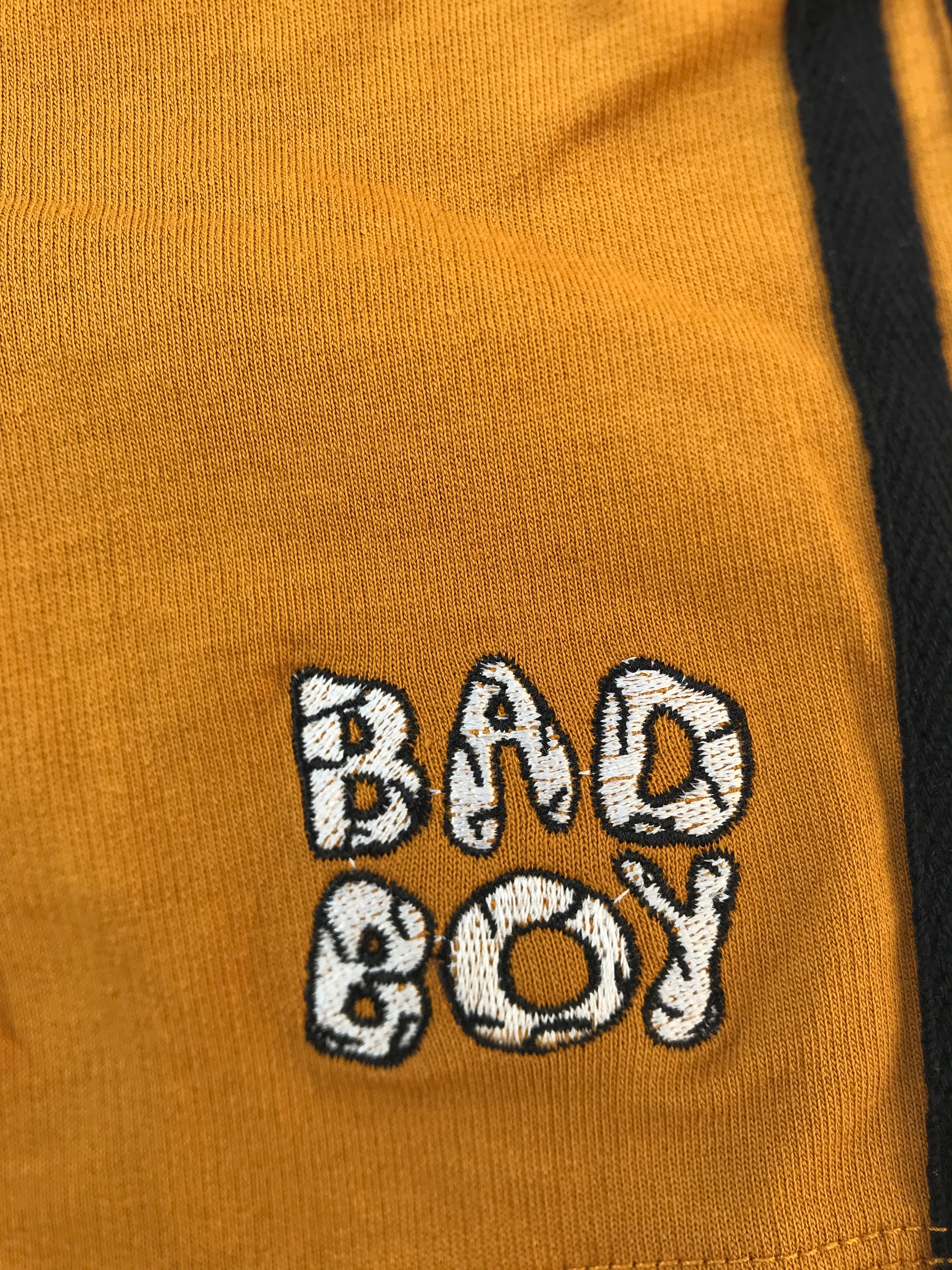 Mustard shorts with black Strips